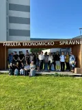 Group photo in front of the faculty building Group photo in front of the faculty building
